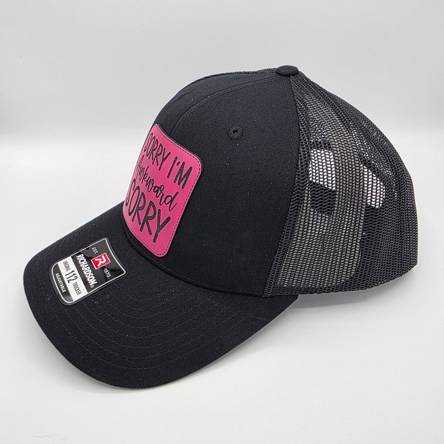 “Sorry I’m Awkward, Sorry” Leather Patch Hat – Richardson 112 Trucker Cap