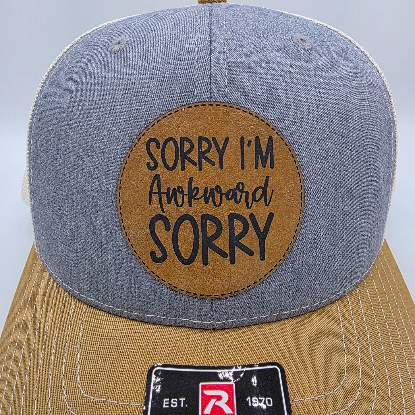 “Sorry I’m Awkward, Sorry” Leather Patch Hat – Richardson 112 Trucker Cap