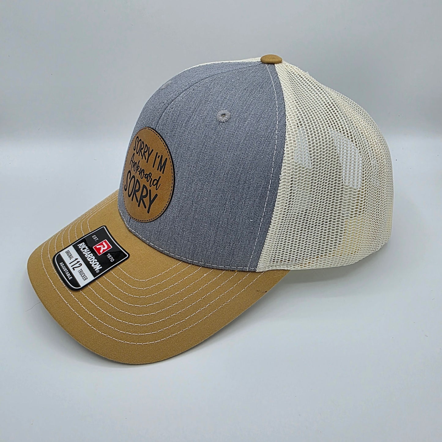 “Sorry I’m Awkward, Sorry” Leather Patch Hat – Richardson 112 Trucker Cap